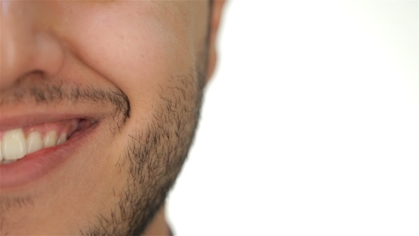 Male Unshaven Face And Smile