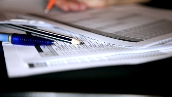 Businesswoman Works With Documents