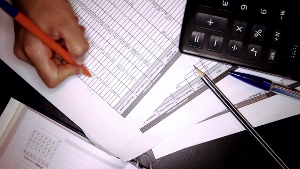 Businesswoman Works With Documents