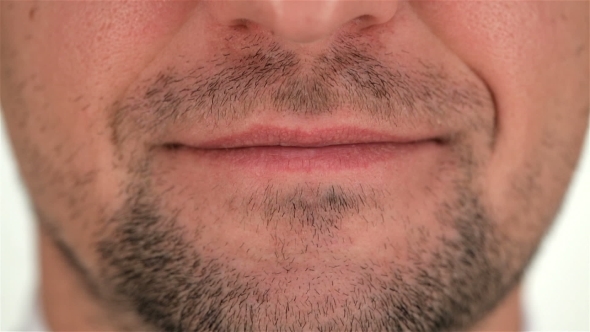 Part Of The Human Unshaven Face And Smile
