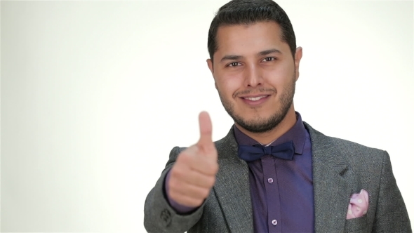 Clothed Formal Male Smiles And Thumb