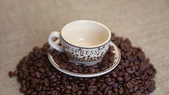 Pour Coffee Benas Into The Cup