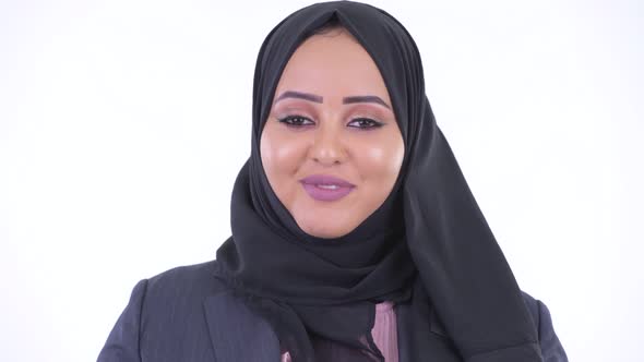 Face of Happy Young African Muslim Businesswoman Talking