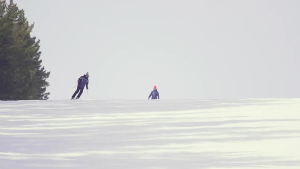 Tourists Relax at the Mountains Ski Resort