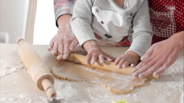 Housewife With Her Daughter Preparing Gingerbread alt
