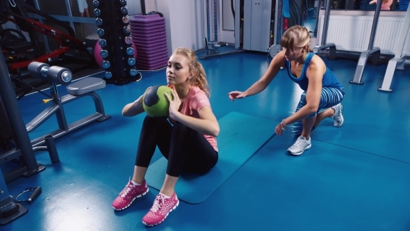 Woman Doing Exercises For The Press