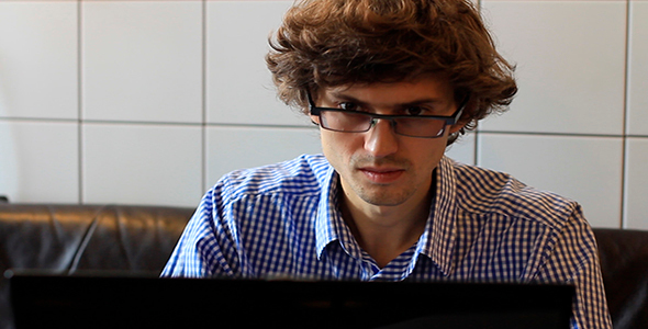 Man Working On Laptop alt