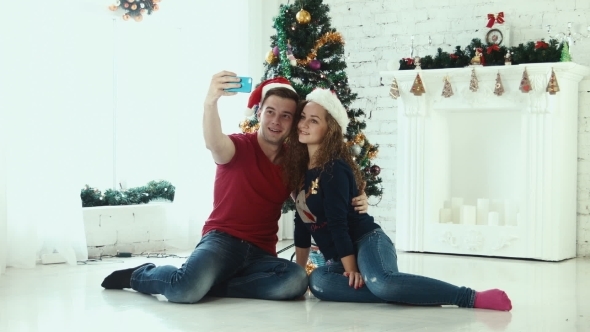 Couple Makes Christmas Selfie