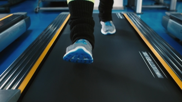 Legs Running On a Treadmill alt
