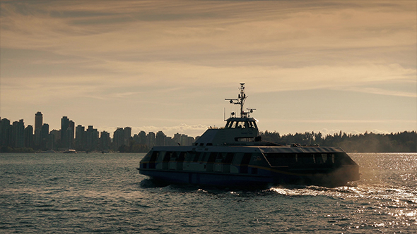 Ferry Crossing To The City In Morning