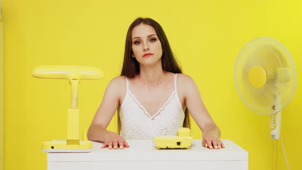 Woman Is Sitting At Workplace