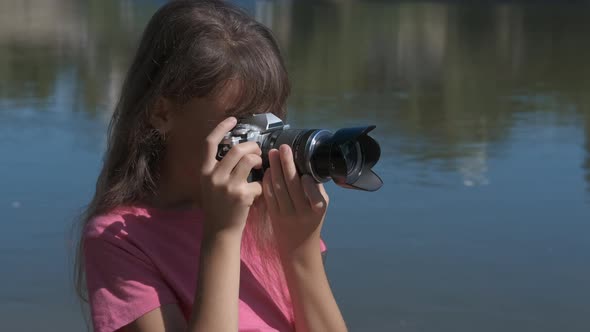 The girl is focusing. 