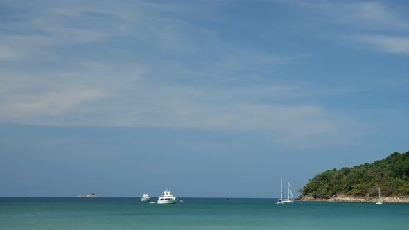 Boats and Yachts Sail in Azure Ocean Near Tropical Island