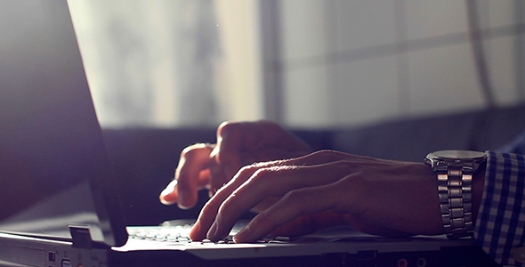 Man Working On Laptop