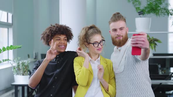 Friends Taking Selfie During Work Break