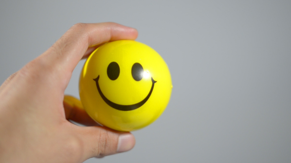 Hand with Smiley Expresses Positive Gesture