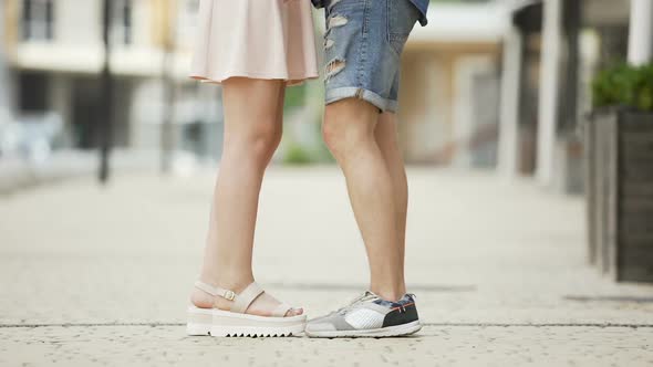 Feet of Male and Female Coming to Each Other, Girl Raising on Tiptoes, Dating