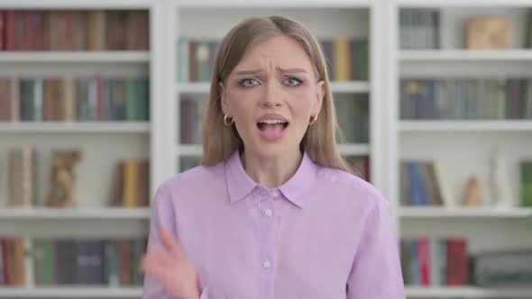 Woman Talking Angrily on Video Chat