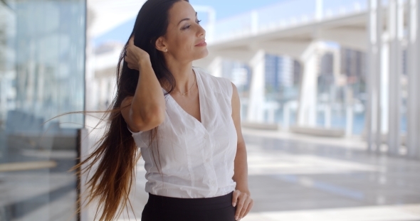 Gorgeous Business Woman Standing On Urban Street