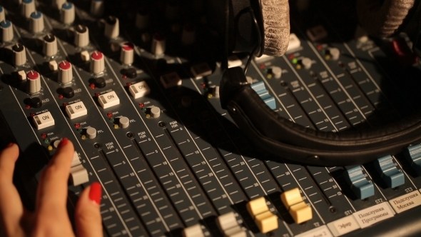 Hand DJ On a Mixer, Operating The Leader