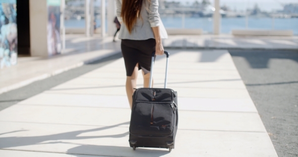 Woman Traveler In An Urban Street