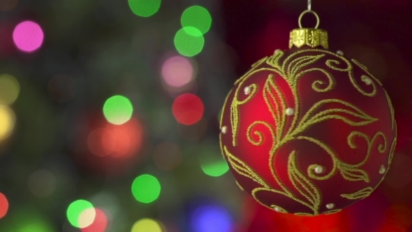 Red Christmas Ball Over Blinking Background