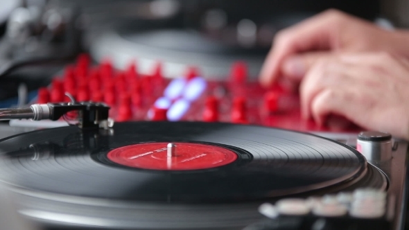 Hands Of a Disc Jockey On The Professional Mixing