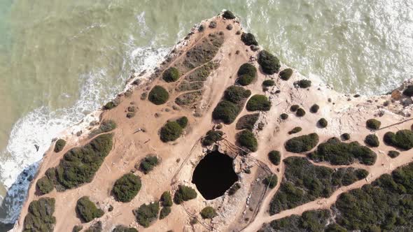 Top view of Benagil Cave and Atlantic sea beach, Lagoa, Algarve, Portugal 