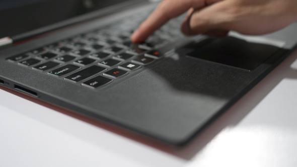 Designer's Hand Busy on New Campaign on Laptop alt