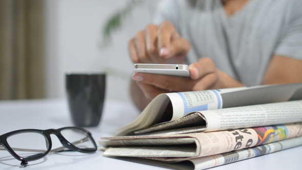 Man Getting Information on Smartphone