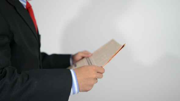 Man Reading Newspaper