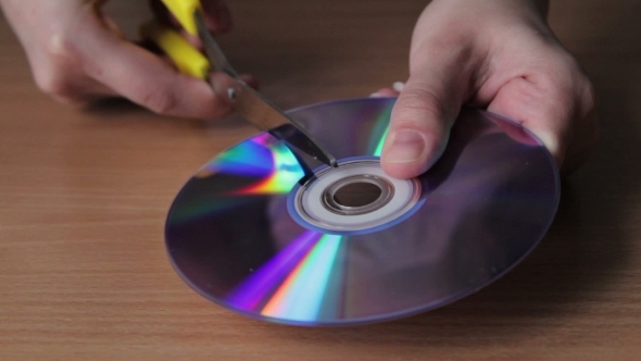 Cutting The Disc With Scissors