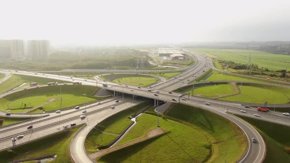 Autos Drive Along Highway Multilevel Traffic Intersection