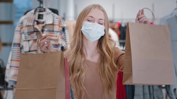 Rich Happy Blonde Woman Shopper Wearing Medical Face Protective Mask Girl Customer Client in