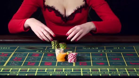 Woman Placing an All in Bet in Roulette
