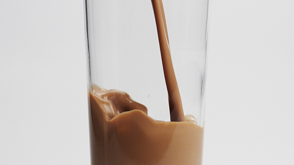 Pouring A Glass Of Chocolate Milk