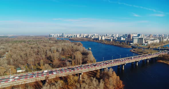 The City Traffic on the Bridge at Autumn Aerial View