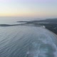 Forward flight over ocean toward Arrawarra Headland at sunset. New South Wales, Australia - VideoHive Item for Sale