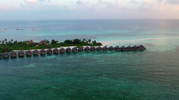 Beach bungalows at Kuredu Island, Maledives