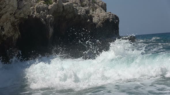 Sea Waves Crashing On The Rocks