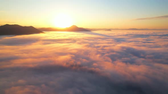 4K Aerial view of Mountains landscape with morning fog.