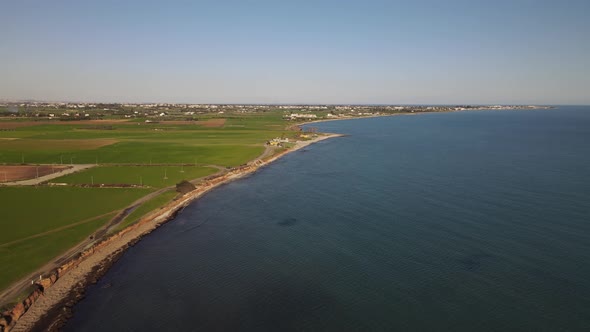 Cyprus green fields. Sea and waves. Fly over beautiful views near Larnaca. Cyprus. Mediterranean. Da