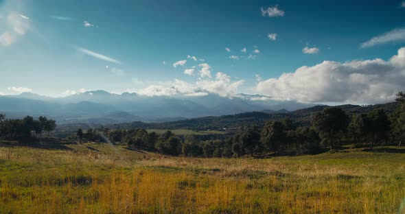 Beautiful Timelapse on Mountain Landscape of Disappearing Clouds on Peak alt