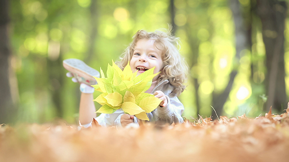 Child In Autumn Park