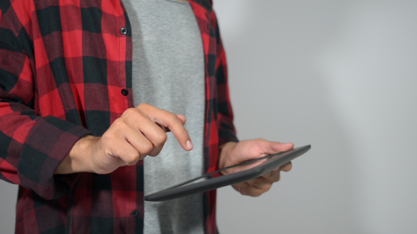 University Student Typing on Tablet PC