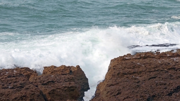 Big Ocean Waves Breaking On Rocks