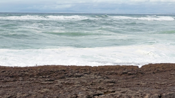 Big Ocean Waves Breaking On Rocks