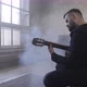 Young Man Playing Guitar in the Room - VideoHive Item for Sale