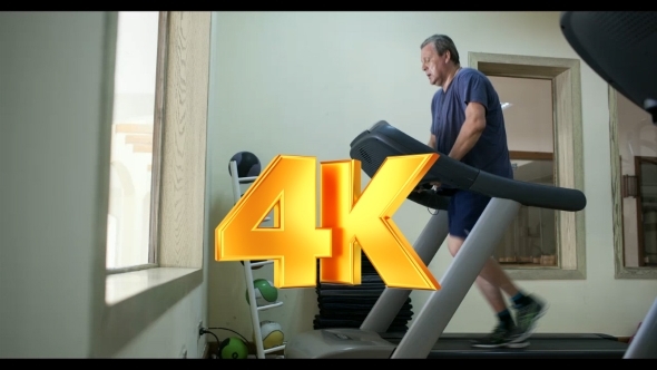 Senior Man Exercising On Treadmill