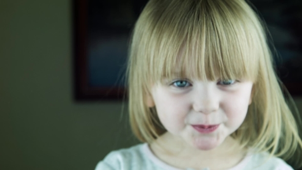 The Little Cute Girl Kisses On The Camera